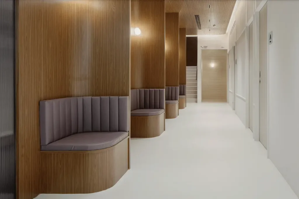 the waiting area of regis medical clinic holland village, a gp clinic located at 255 holland avenue