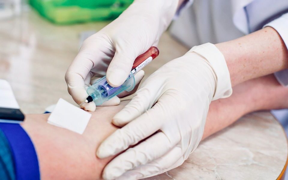Clinic performing blood test for food intolerances