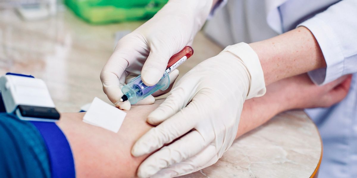 Clinic performing blood test for food intolerances
